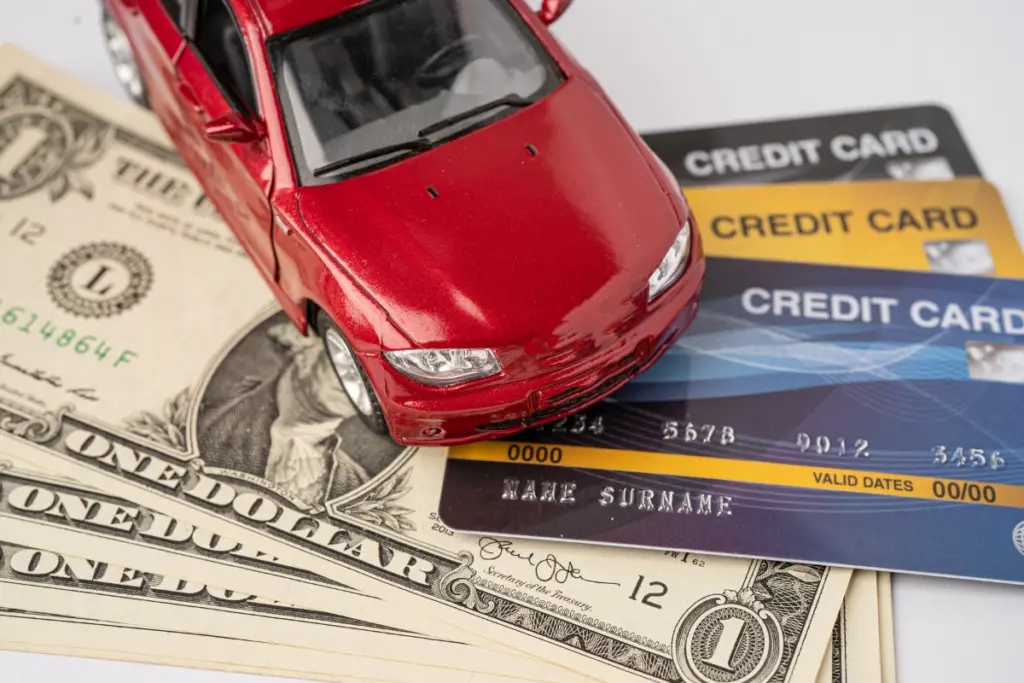 Car on top of credit cards for the WFBNA Auto.